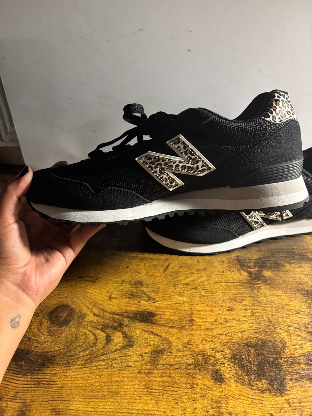 Classic Black Sneakers with Leopard Accent
